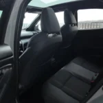 2025 Toyota Yaris Cross achterbank-gebied met passagiersstoelen, interieormaterialen en cabineruimte voor achterpassagiers