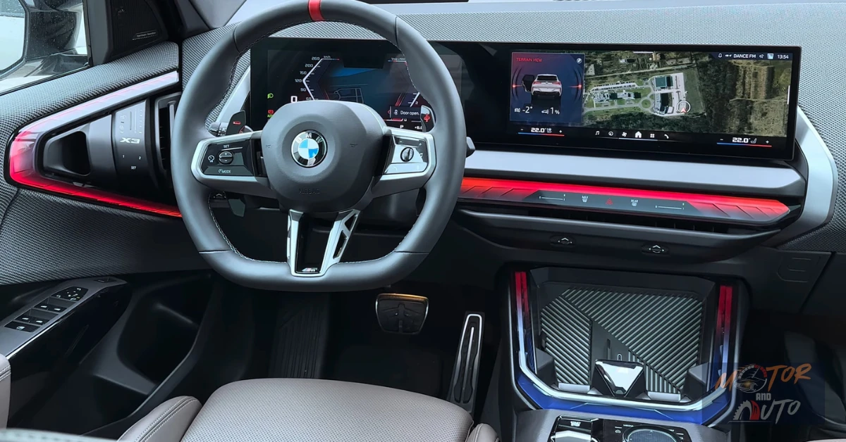 Bestuurders cockpit van de 2025 BMW X3 M50 met iDrive 9 interface en ambiance verlichting