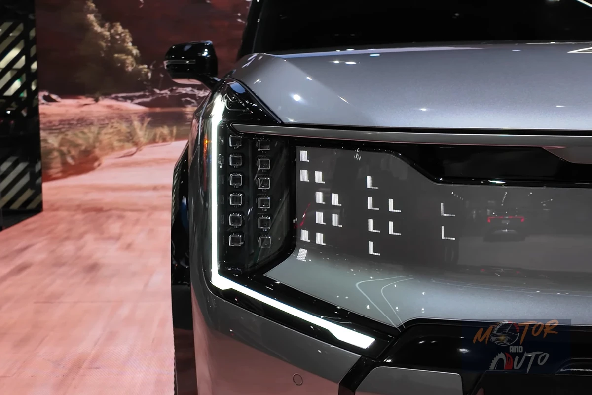 Detailopname van de digitale grille van de Kia EV9 GT met het "Energetic" LED-lichtpatroon ontwerp