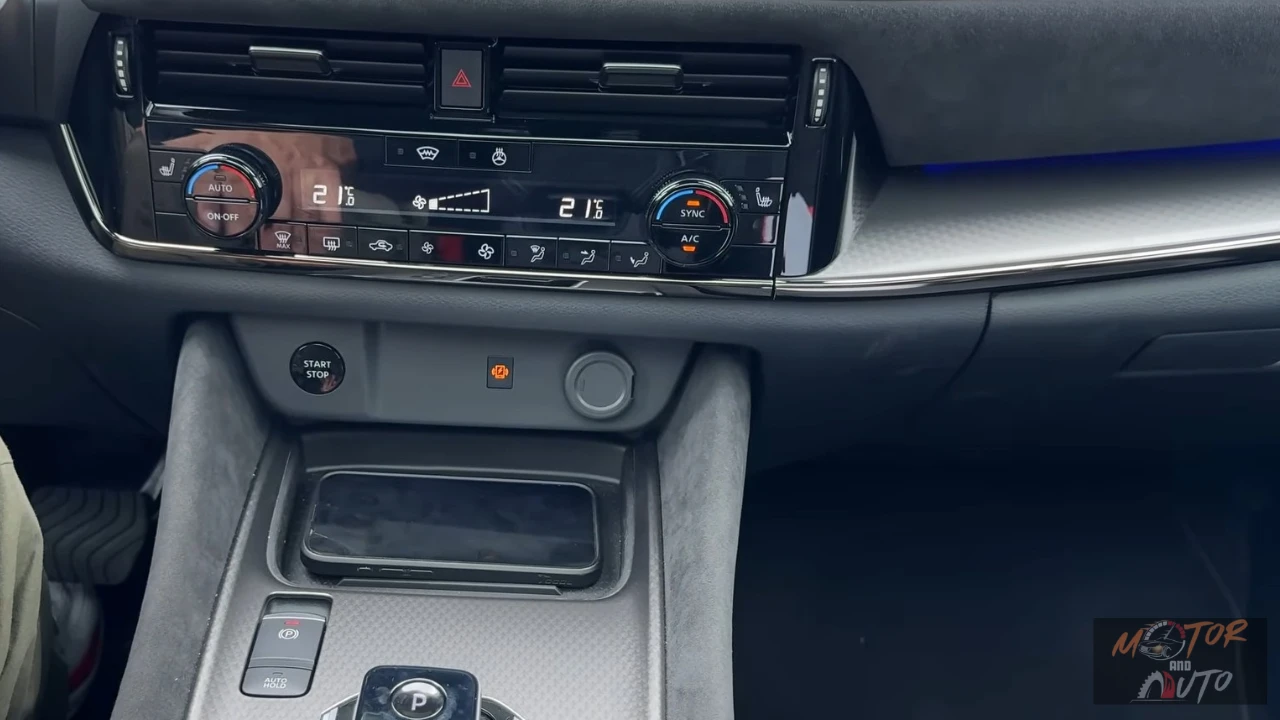 Nissan Qashqai 2025 Klimaatregeling en draadloos oplaadgebied