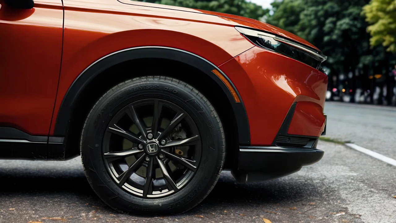 2025 Honda CR-V rode SUV wieldetail met lichtmetalen velg ontwerp en zijkant carrosserie bekleding