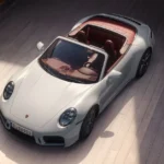 Bovenaanzicht van de 2025 Porsche 911 Carrera S Cabriolet met rood lederen interieur en cabriolet-design