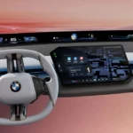 Compleet overzicht van BMW's nieuwe generatie dashboard met het Panoramisch Vision systeem en centrale infotainment display