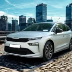 2025 Škoda Enyaq electric SUV three-quarter front view in white showing 20-inch alloy wheels, sleek SUV profile on urban bridge with city skyline background