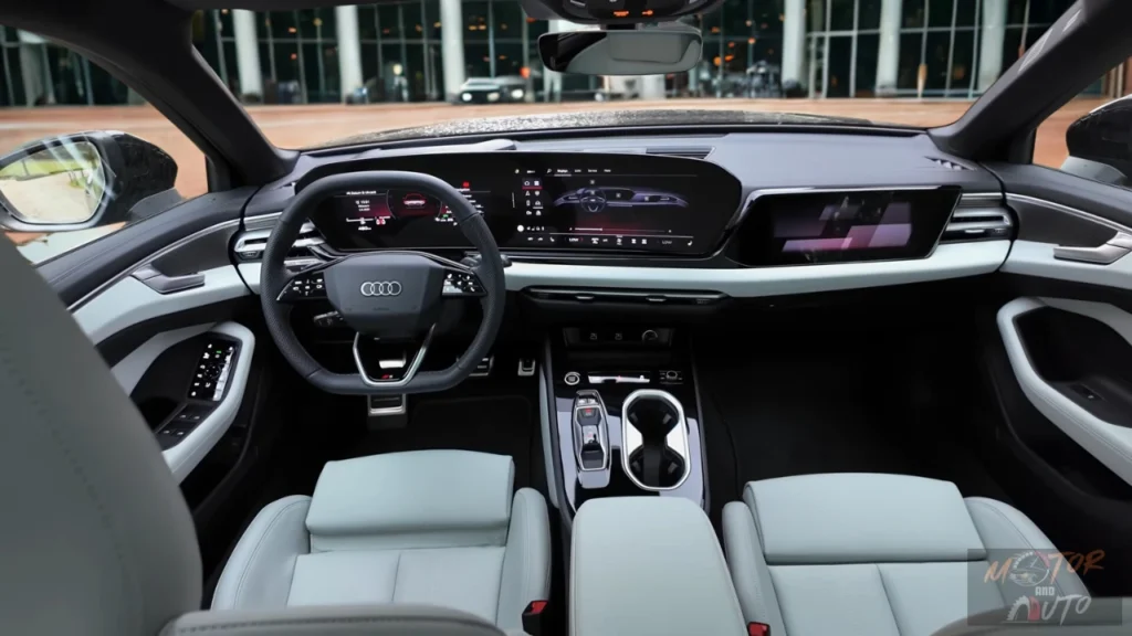 Breed interieurzicht van 2026 Audi A6 met complete cabine-indeling met drie digitale schermen, voorstoelen, middenconsole en moderne designelementen