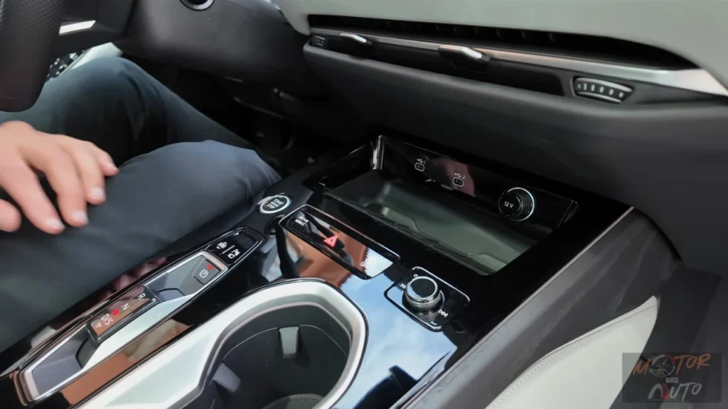 De verfijnde middenconsole van de 2026 Audi A6 beschikt over draadloze oplaadpad, USB-C poorten, en rijmodusselector
