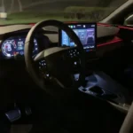 2025 Cupra Terramar interieur bij nacht met LED sfeerverlichting in rode tinten