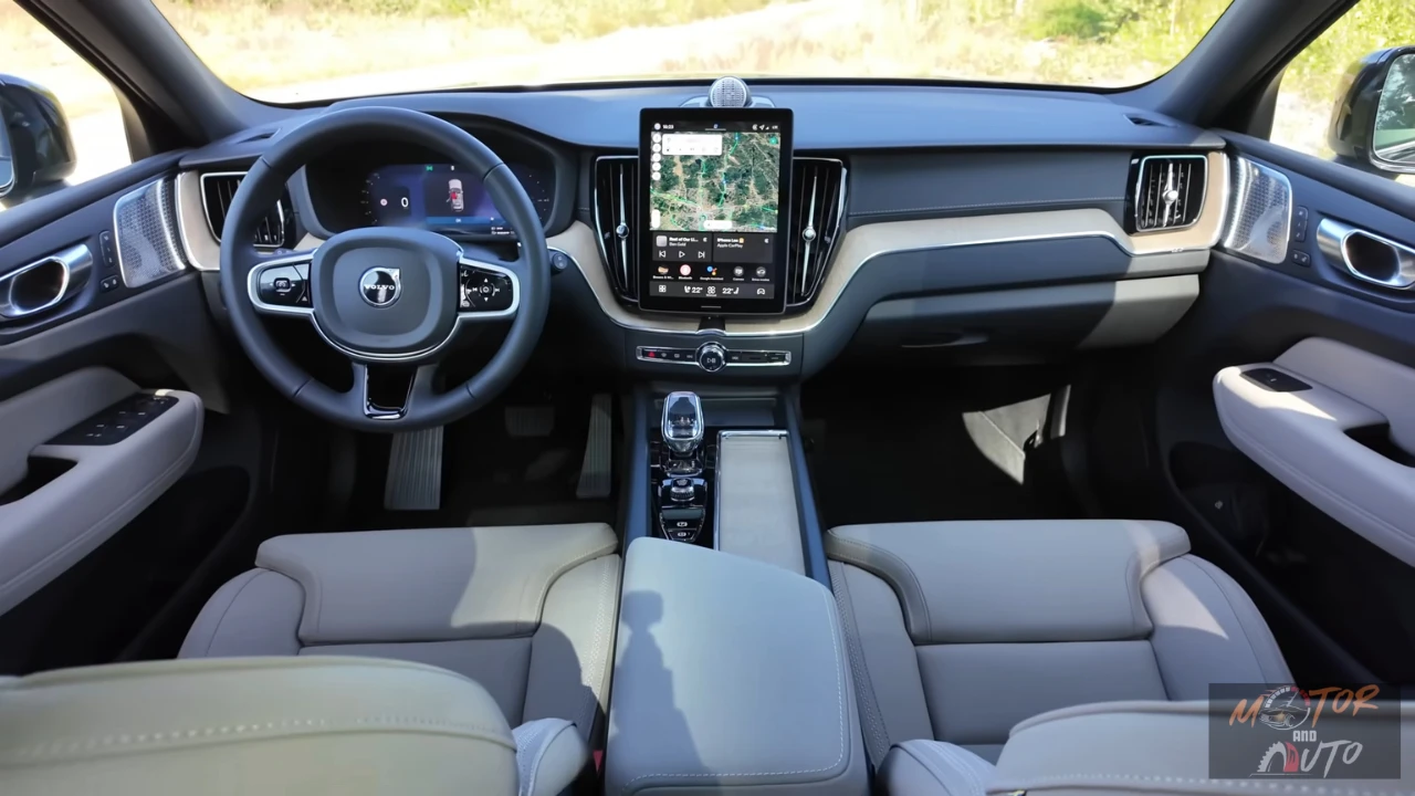 2026 Volvo XC60 volledig dashboard overzicht met 11,2-inch Google Automotive touchscreen, digitale instrumenten, stuurwiel bediening en premium interieur materialen