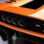 Garagisti & Co GP1 Achterdetail met X-Patroon Achterlichten en Vier Uitlaten