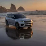 2026 Jeep Grand Cherokee Strand Zonsondergang Zijprofiel Weergave