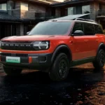 Ford Bronco Elektrisch Vooraanzicht bij Zonsondergang met Dak Camping Pakket